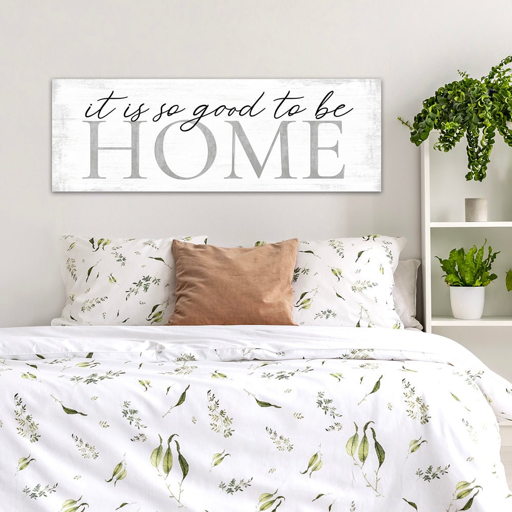 It is So Good To Be Home Sign Family Canvas Wall Art Above Bed in Couples Bedroom - Pretty Perfect Studio