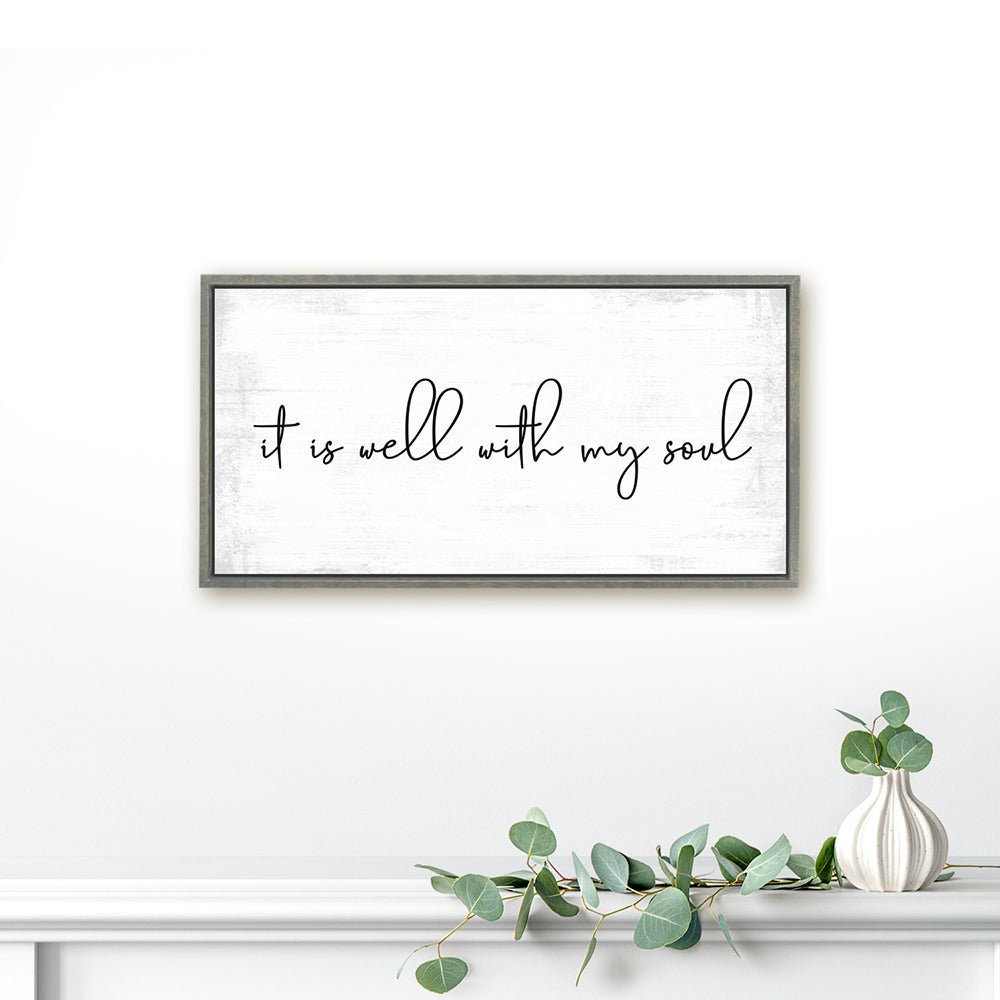 It Is Well With My Soul Canvas Sign Hanging on Wall Above Shelf - Pretty Perfect Studio