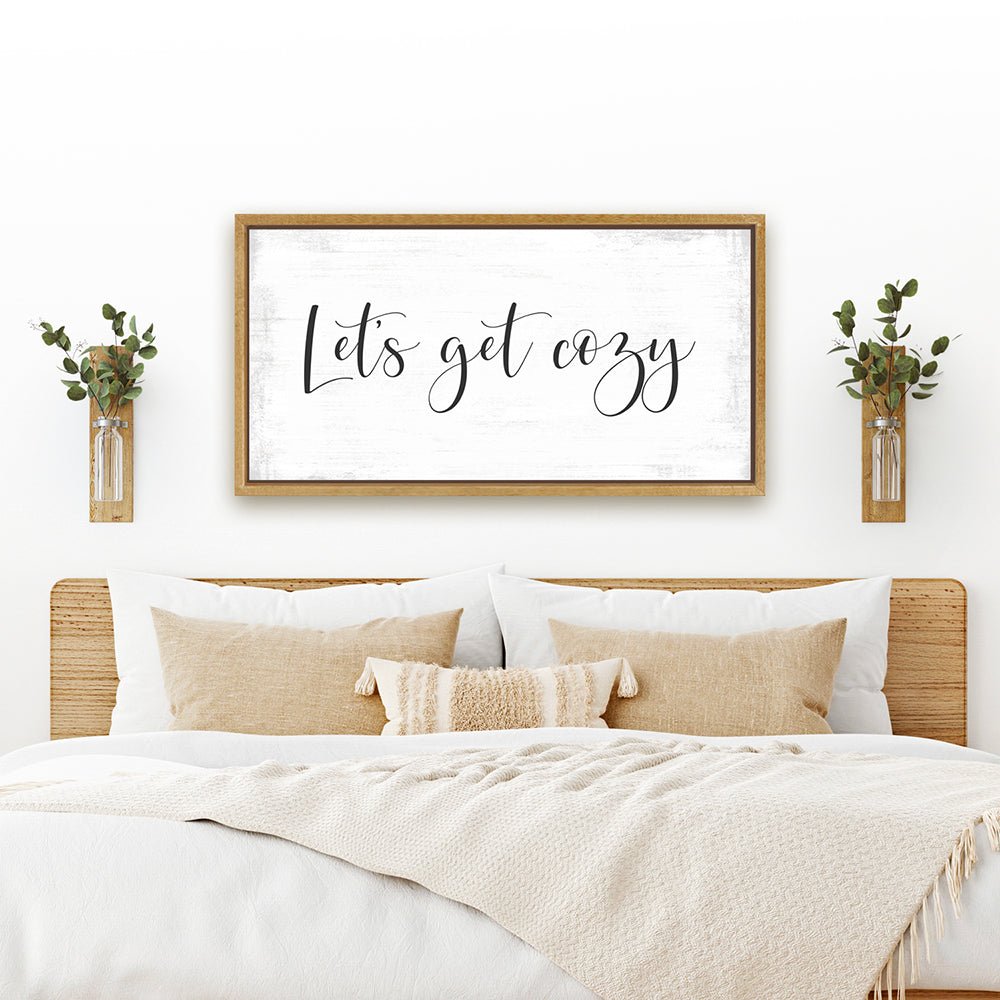 Let's Get Cozy Sign Hanging Above The Bed - Pretty Perfect Studio