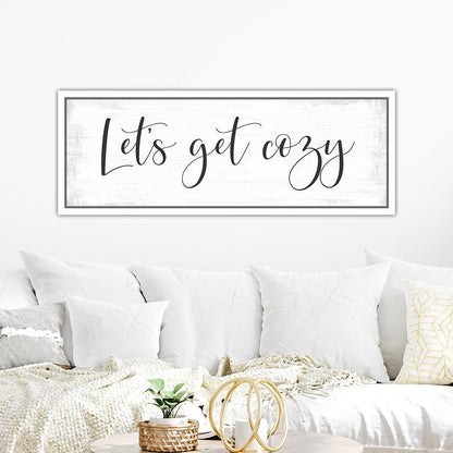 Let's Get Cozy Sign Hanging Above the Couch - Pretty Perfect Studio