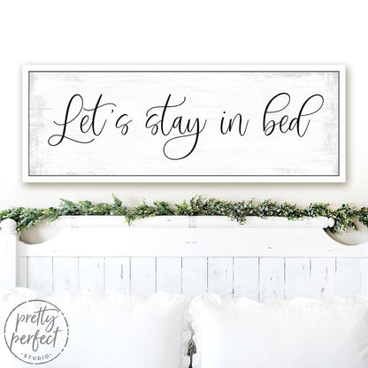Let's Stay In Bed Canvas Sign Above Shelf - Pretty Perfect Studio