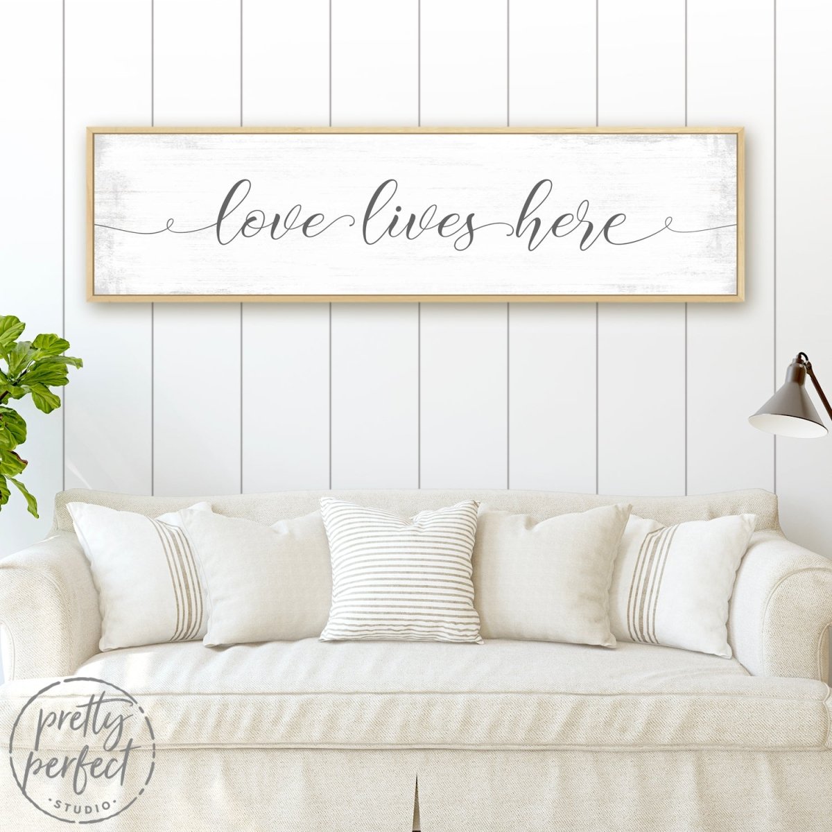 Love Lives Here Sign Above Couch - Pretty Perfect Studio