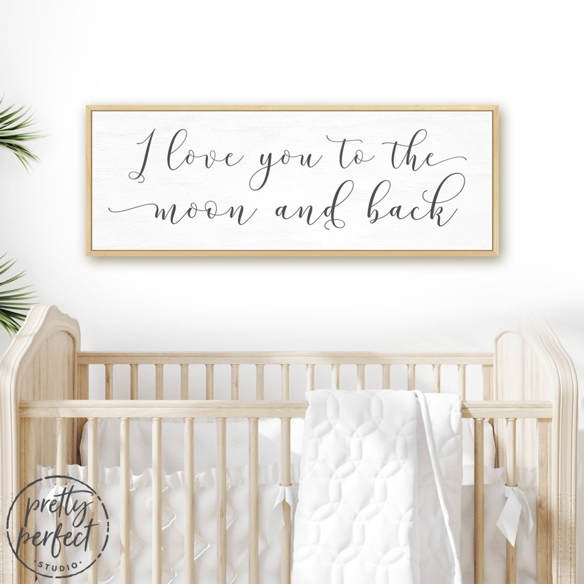 Love You To The Moon And Back Sign Above Bed - Pretty Perfect Studio