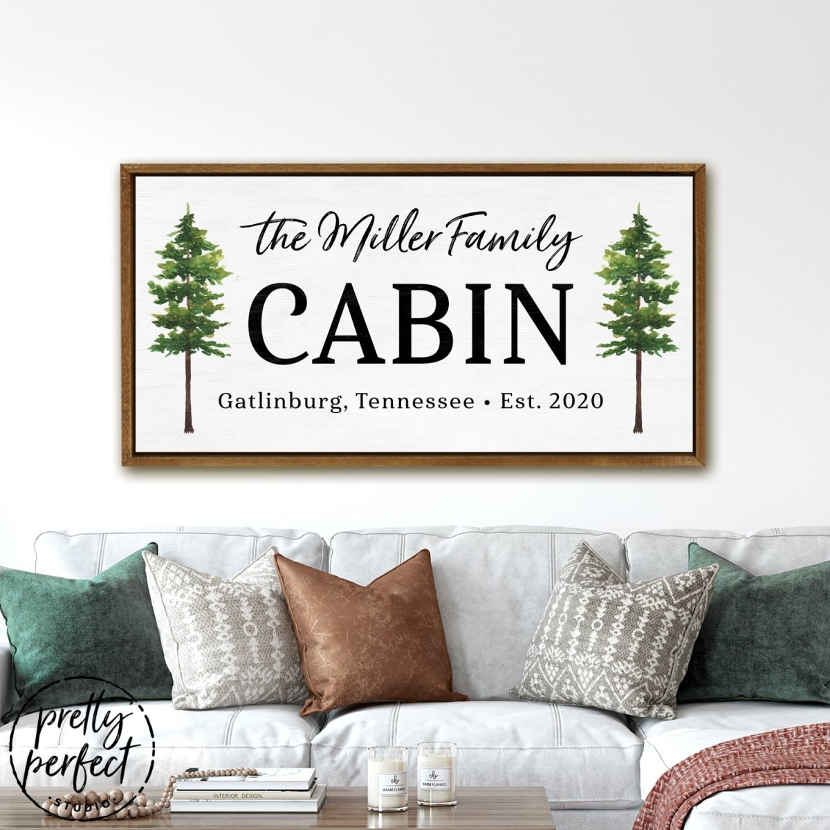 Personalized Family Cabin Sign Hanging Above Couch - Pretty Perfect Studio