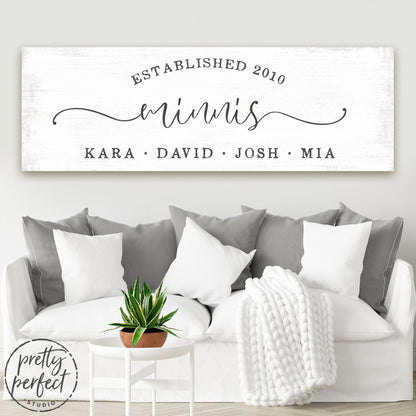 Personalized Family Names Wall Art With Established Date Above Couch in Living Room - Pretty Perfect Studio