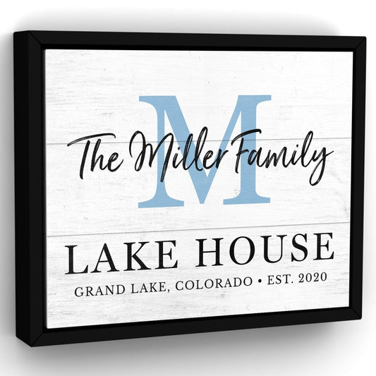 Personalized lake house sign with large initial and family name displayed in a framed wall art design