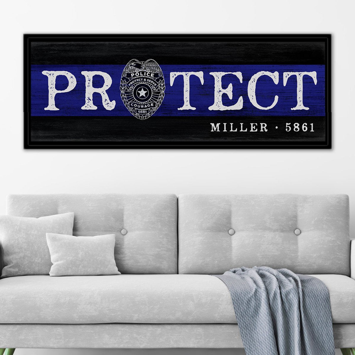 Police Officer Blue Line Protect Sign With Name Above Couch in Living Room - Pretty Perfect Studio