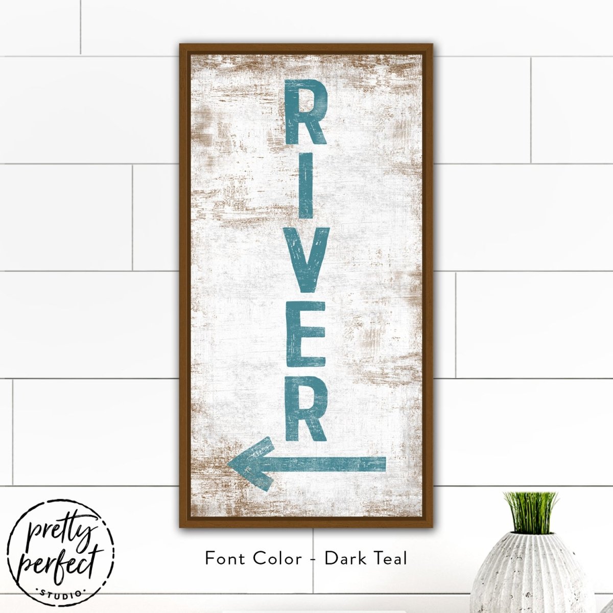 River cabin wall art print styled above modern workspace desk