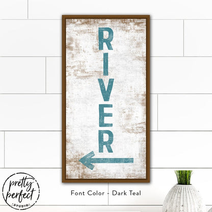 River cabin wall art print styled above modern workspace desk