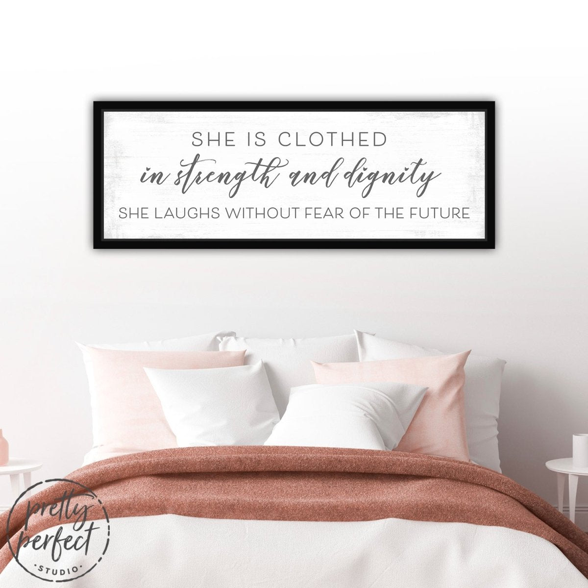She Is Clothed In Strength and Dignity Sign Above Bed - Pretty Perfect Studio