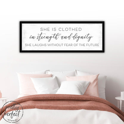She Is Clothed In Strength and Dignity Sign Above Bed - Pretty Perfect Studio
