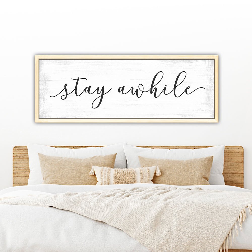 Stay Awhile Canvas Sign Hanging Above Bed in Master Bedroom - Pretty Perfect Studio