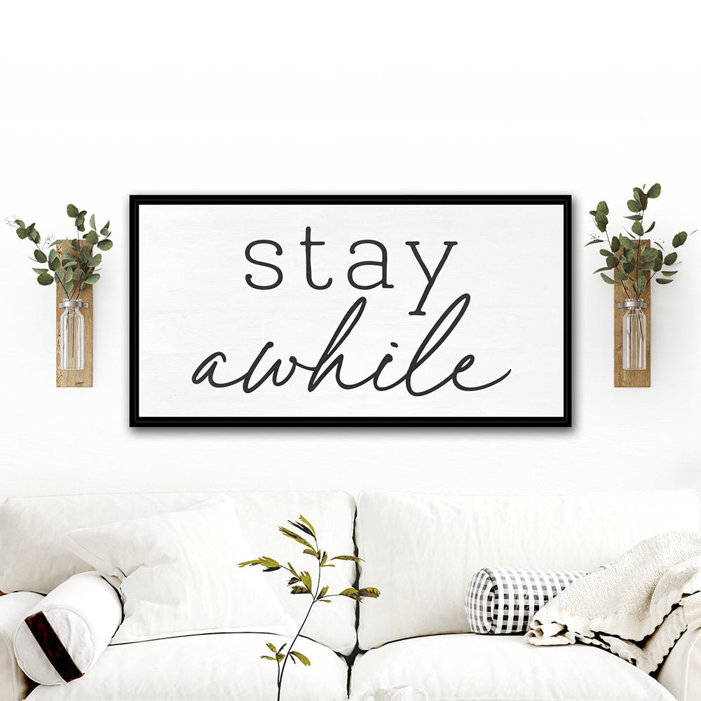 Stay Awhile Canvas Wall Art Hanging On Wall Above Couch - Pretty Perfect Studio