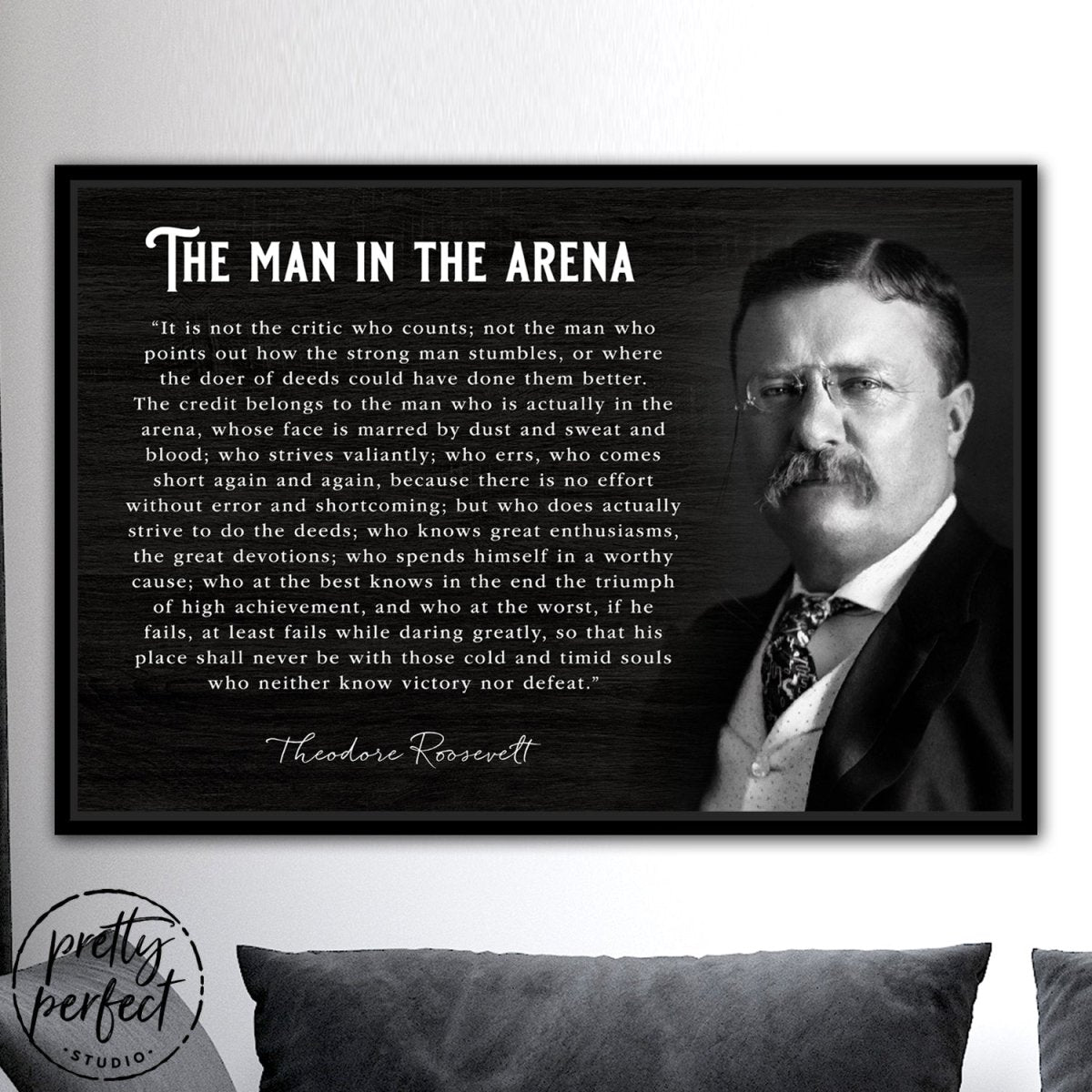 The Man In The Arena Canvas Wall Art above the couch - Pretty Perfect Studio